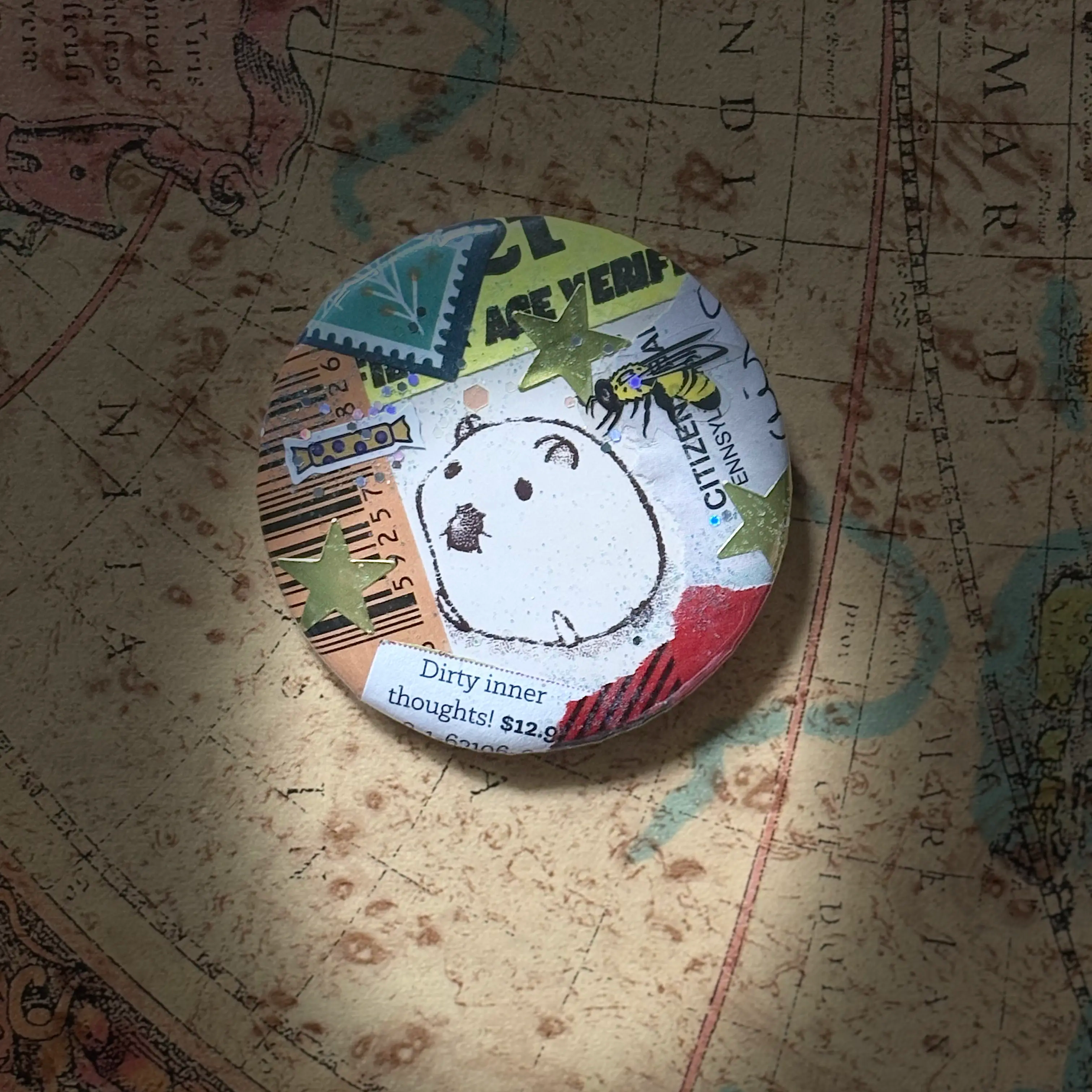 Round collage pin with a cartoon hamster, a wasp, and the phrase Dirty inner thoughts